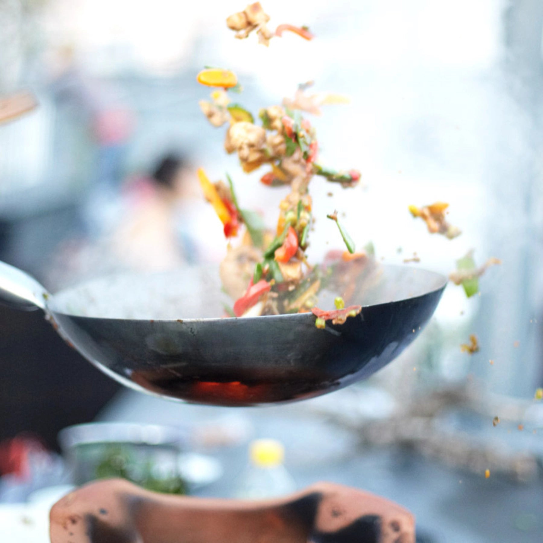 What a Wok - Schwenken von Gargut